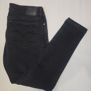 Levi Strauss Ladies' Skinny stretch jeans, black strided  in size 29
